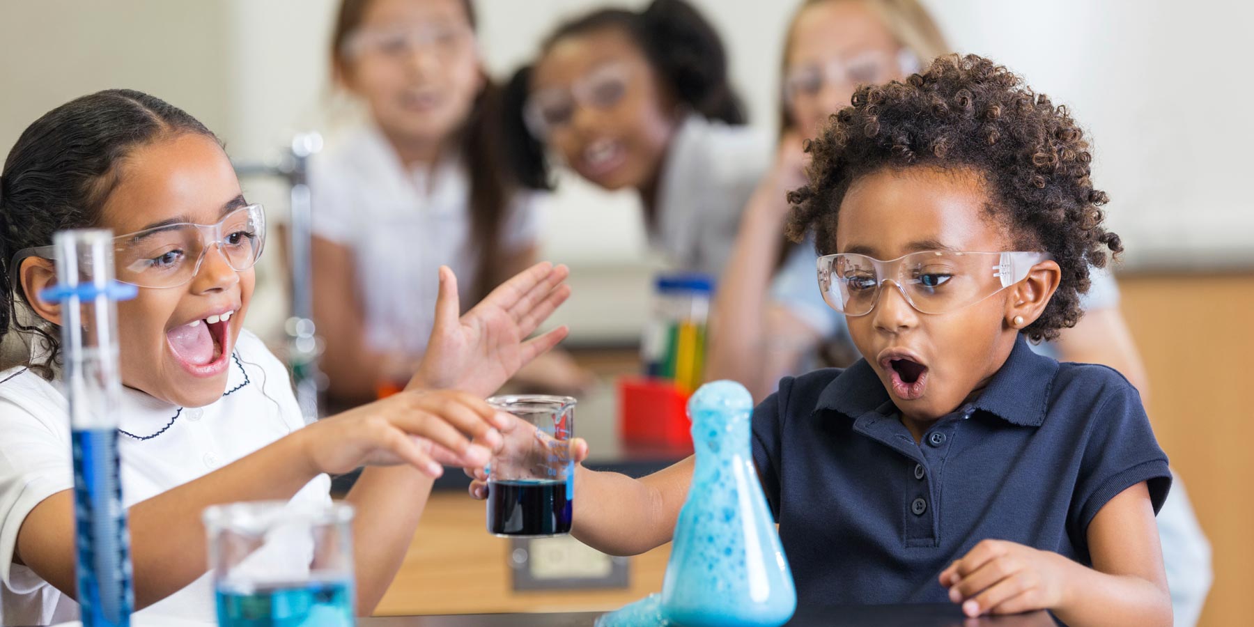 amazed children in chemistry lab